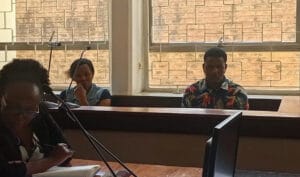 Wajir Chief Abdullahi Abdi Sheikh and Huduma Centre official Veronica Njenga