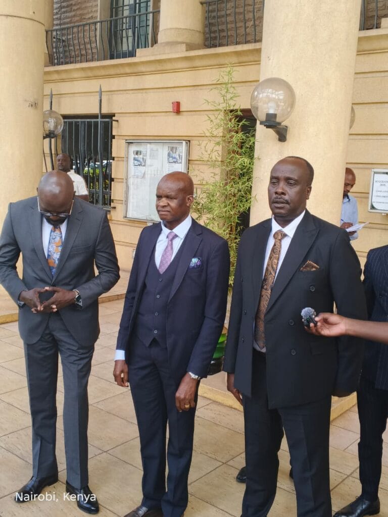 Embu Senator Alexander Munyi Mundigi denies campaigning for rival political aspirant. Lawyer Cliff Ombetta, Embu Senator Alexander Munyi Mundigi and Lawyer Danstan Omar during a press briefing in Nairobi.